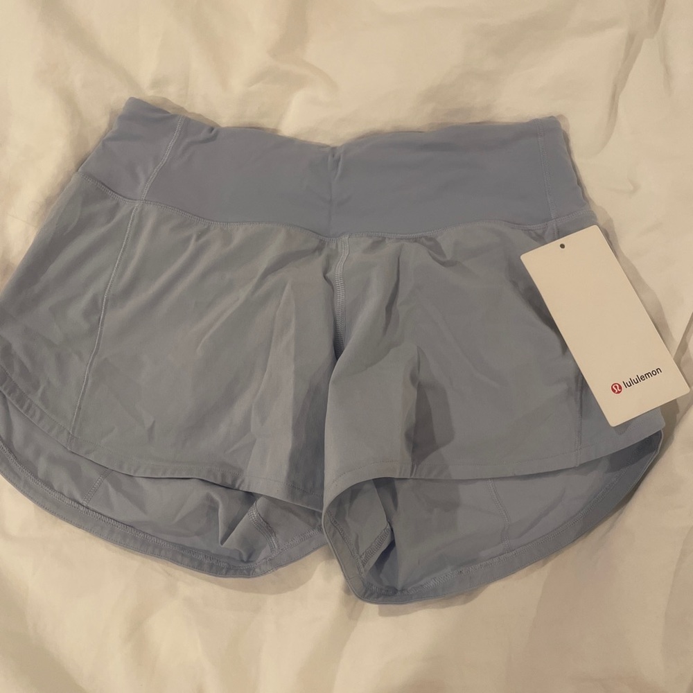 lululemon speed up shorts mid rise 4” size 4 blue linen